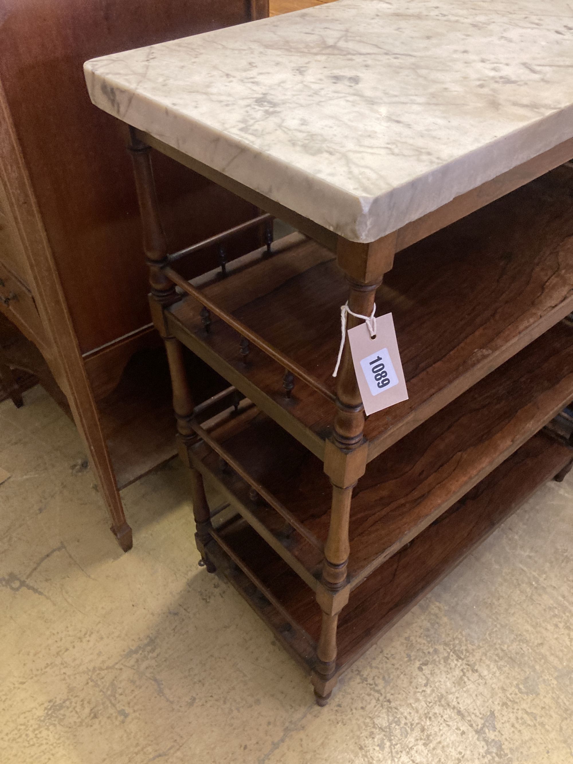 A Victorian rosewood three tier whatnot with marble top, width 69cm, depth 32cm, height 83cm